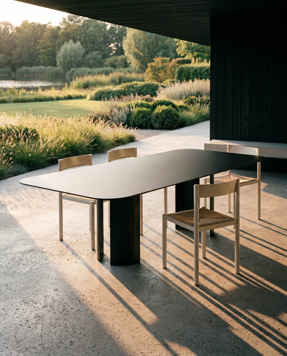India L Black Table and Ripa Chairs by RIPA At Savannah Bay Gallery