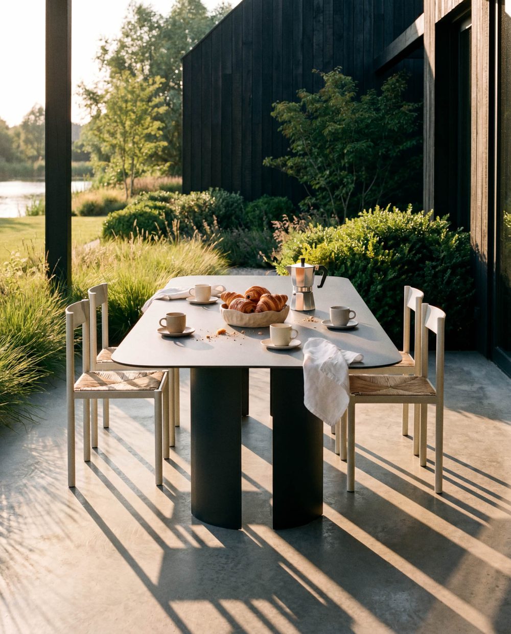 India L Black Table and Ripa Chairs by RIPA At Savannah Bay Gallery 2