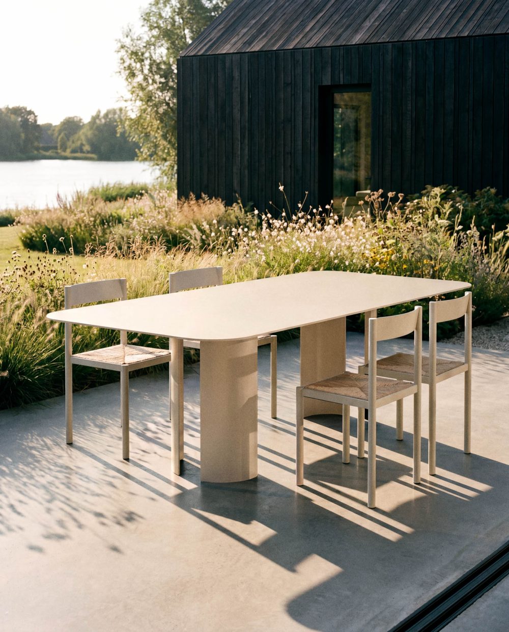 India L Beige Table and Ripa Chairs by RIPA At Savannah Bay Gallery 3