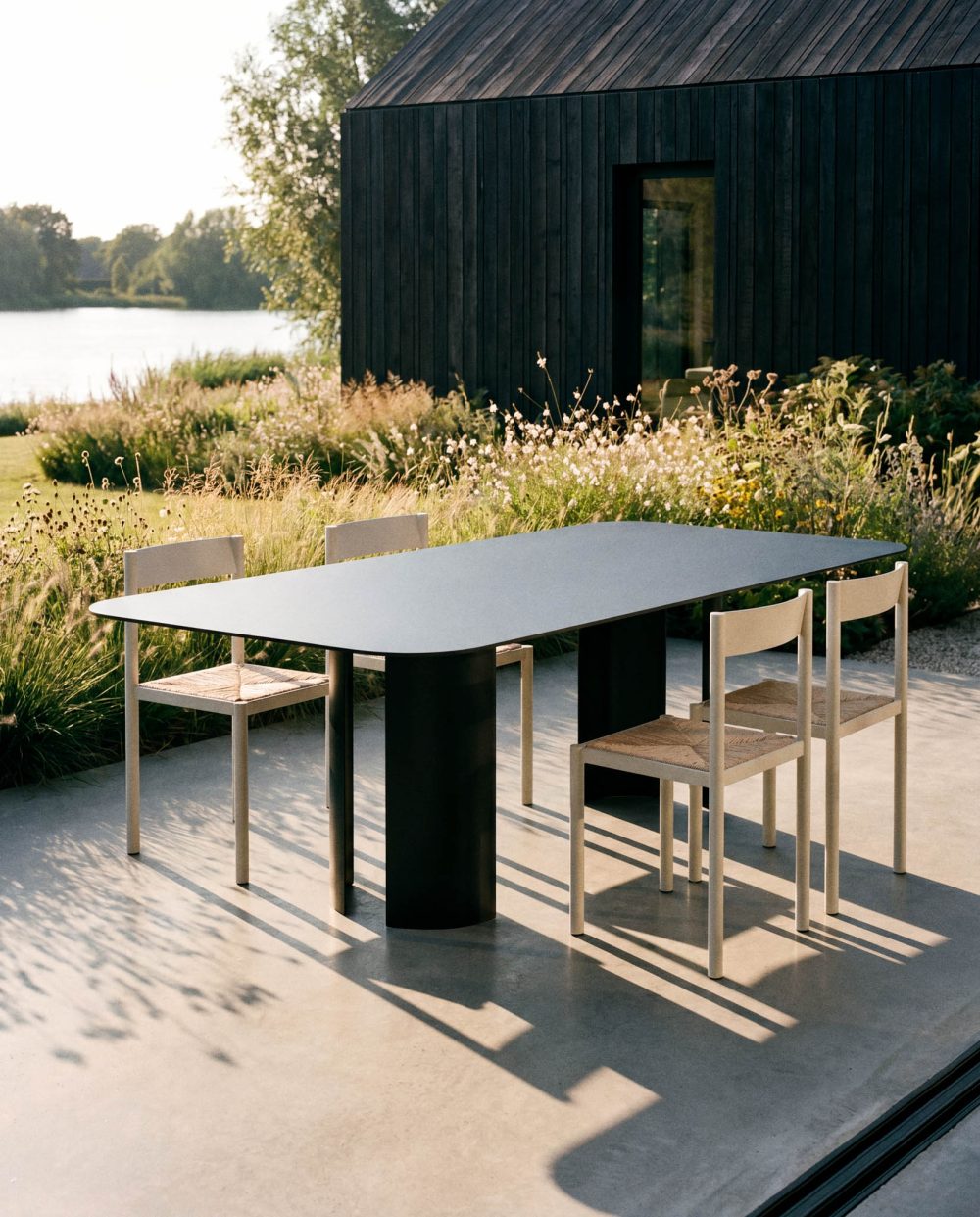 India L Black Table and Ripa Chairs by RIPA At Savannah Bay Gallery 3