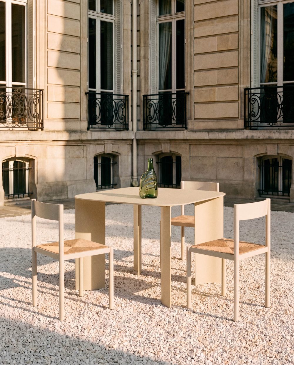 India S Beige Table and Pond Chairs by RIPA At Savannah Bay Gallery