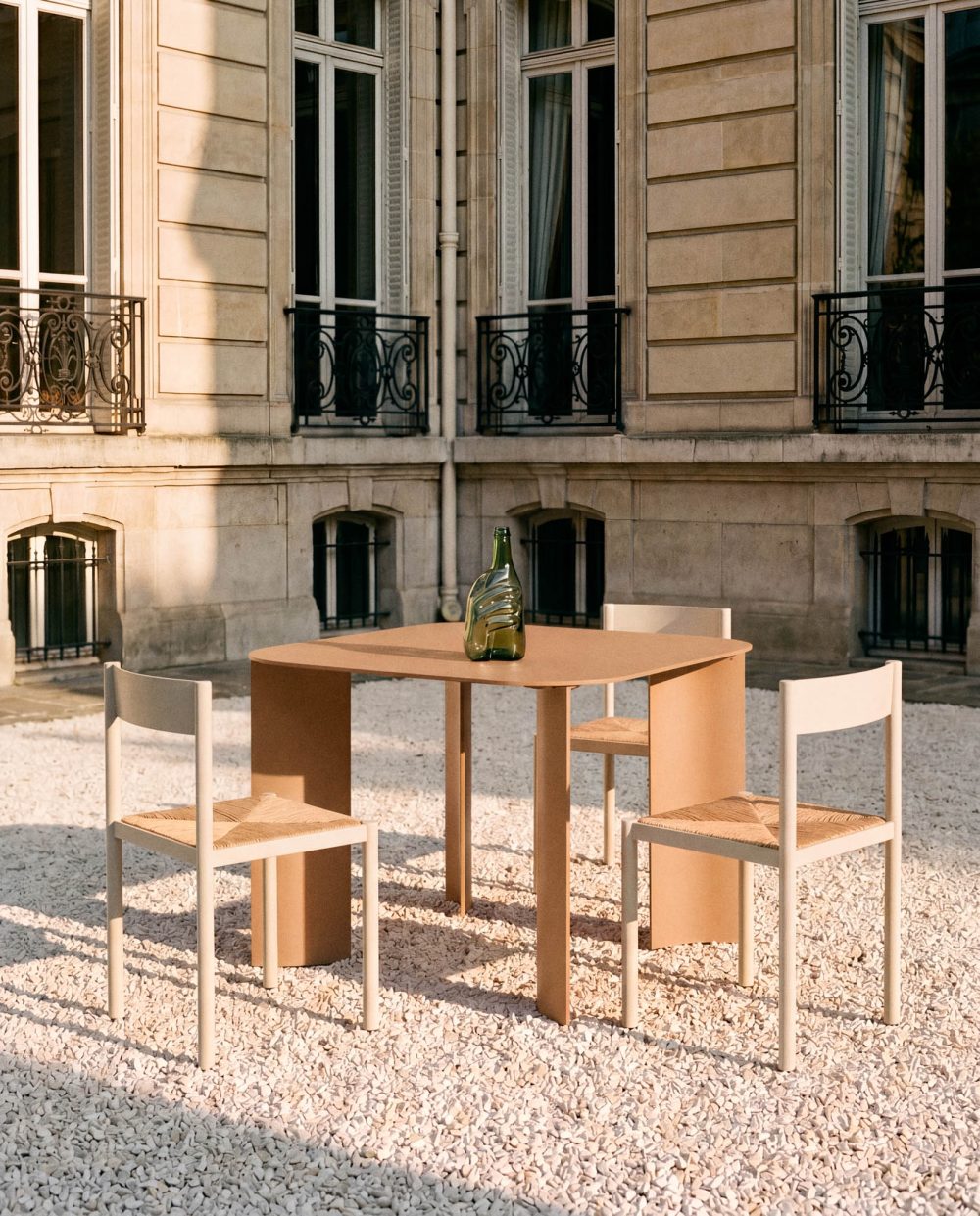 India S Brown Table and Pond Chairs by RIPA At Savannah Bay Gallery