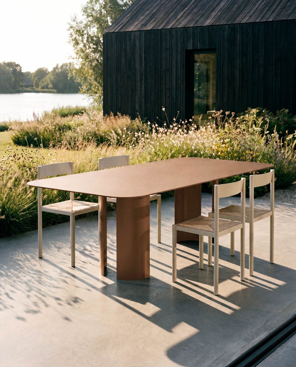 India L Brown Table and Ripa Chairs by RIPA At Savannah Bay Gallery